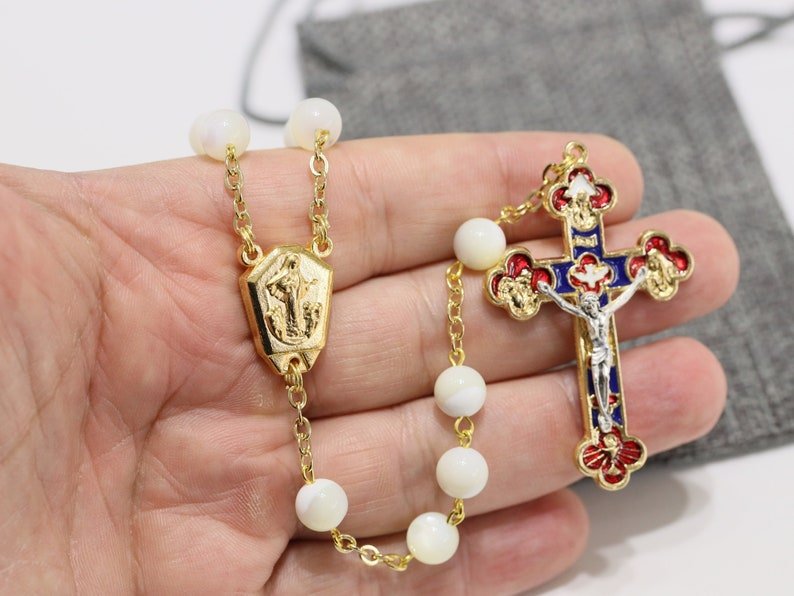 Fresh Water Pearls rosary with gold plated offers crucifix, Virgin Mary centre piece and links